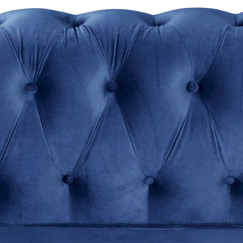Causeuse en velours capitonnée avec clous décoratifs