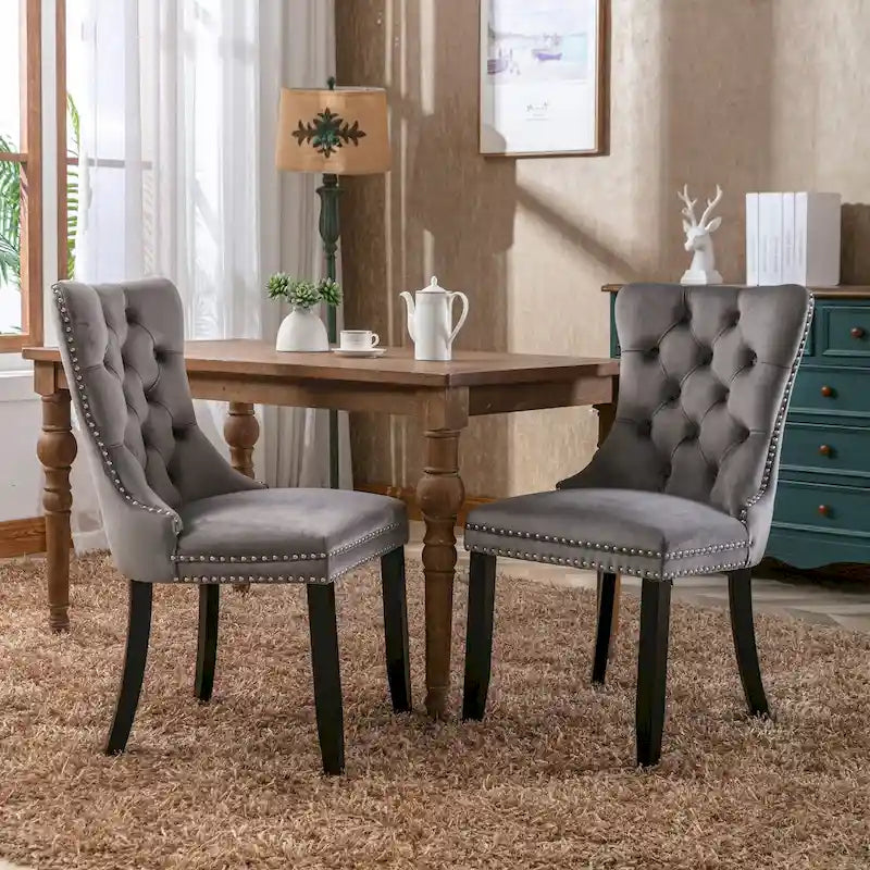 Lot de 2 chaises de salle à manger tapissées de velours avec garniture cloutée et pieds en bois